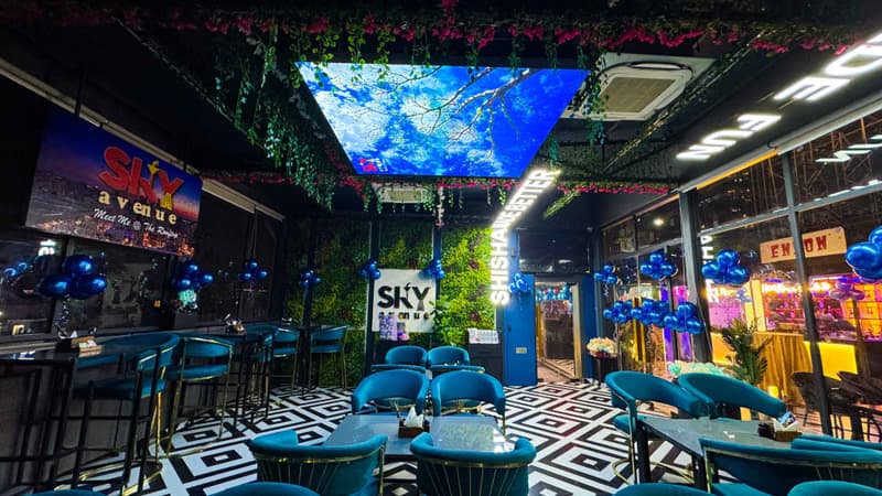 SKY AVENUE rooftop dining overlooking the city skyline